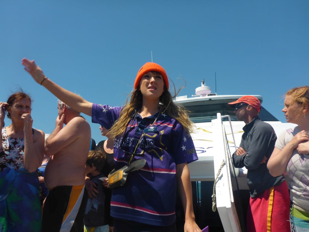 Tour guide and tourists on the deck of our Seastar Cruises tour boat