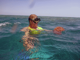 Tour guide with Sea Cucumber