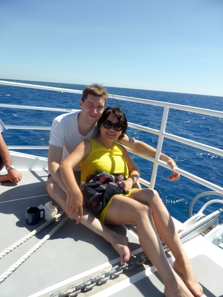 Tim and Miaomiao on the deck of our Seastar Cruises tour boat going to Cairns