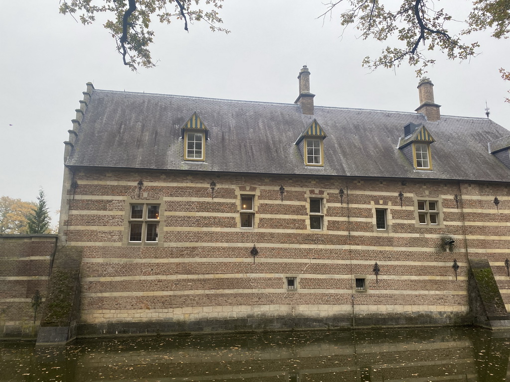 Southwest side and moat of the Heeswijk Castle, viewed from the Kasteel road