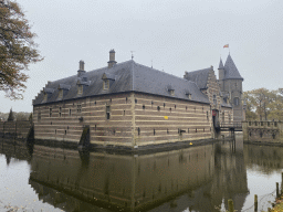 Southwest side and moat of the Heeswijk Castle, viewed from the Kasteel road