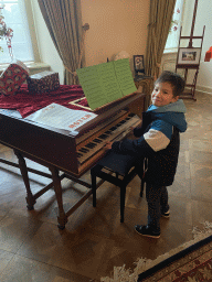 Max with a piano at the painting room at the ground floor of the main building of the Heeswijk Castle, during the `Sint op het Kasteel 2022` event