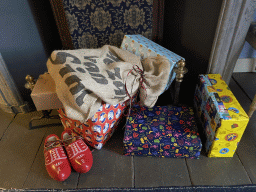 Hearth with presents at the resting room at the first floor of the main building of the Heeswijk Castle, during the `Sint op het Kasteel 2022` event