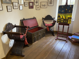 Chairs, chest, painting and presents at the Pieten room at the second floor of the main building of the Heeswijk Castle, during the `Sint op het Kasteel 2022` event