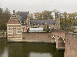 Moat, bridge, entrance, shop and restaurant of the Heeswijk Castle, viewed from the outer square at the main building, during the `Sint op het Kasteel 2022` event