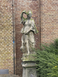 Statue at the garden of the Heeswijk Castle