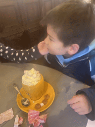 Max having a hot chocolate at the restaurant of the Heeswijk Castle