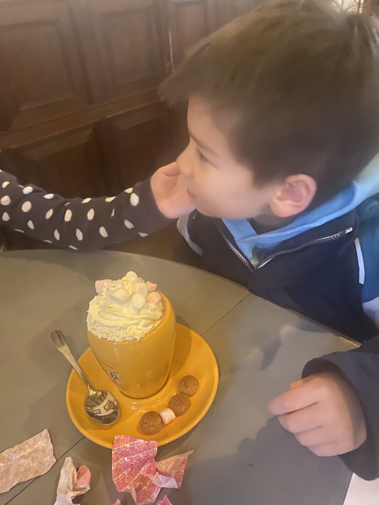 Max having a hot chocolate at the restaurant of the Heeswijk Castle