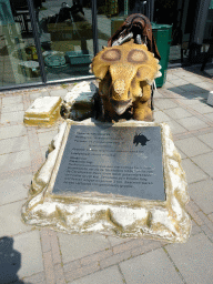 Achelousaurus statue at the entrance to the main building of the HistoryLand museum, with explanation