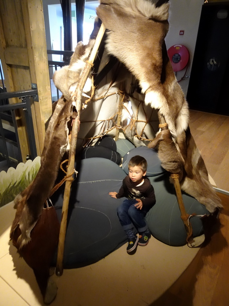 Max in a wigwam at the upper floor of the main building of the HistoryLand museum