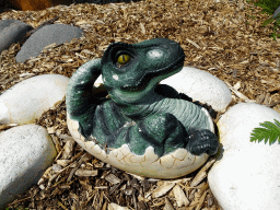 Statue of a Dinosaur in an egg at the Dinopark area at the HistoryLand museum