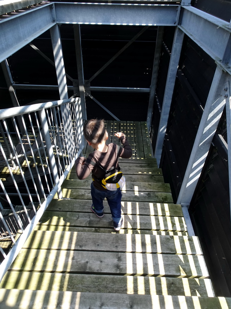 Max on the staircase of the Spiegelzee building at the HistoryLand museum