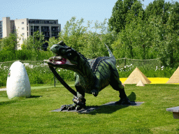 Dinosaur, snake and egg statues at the miniature golf course at the HistoryLand museum