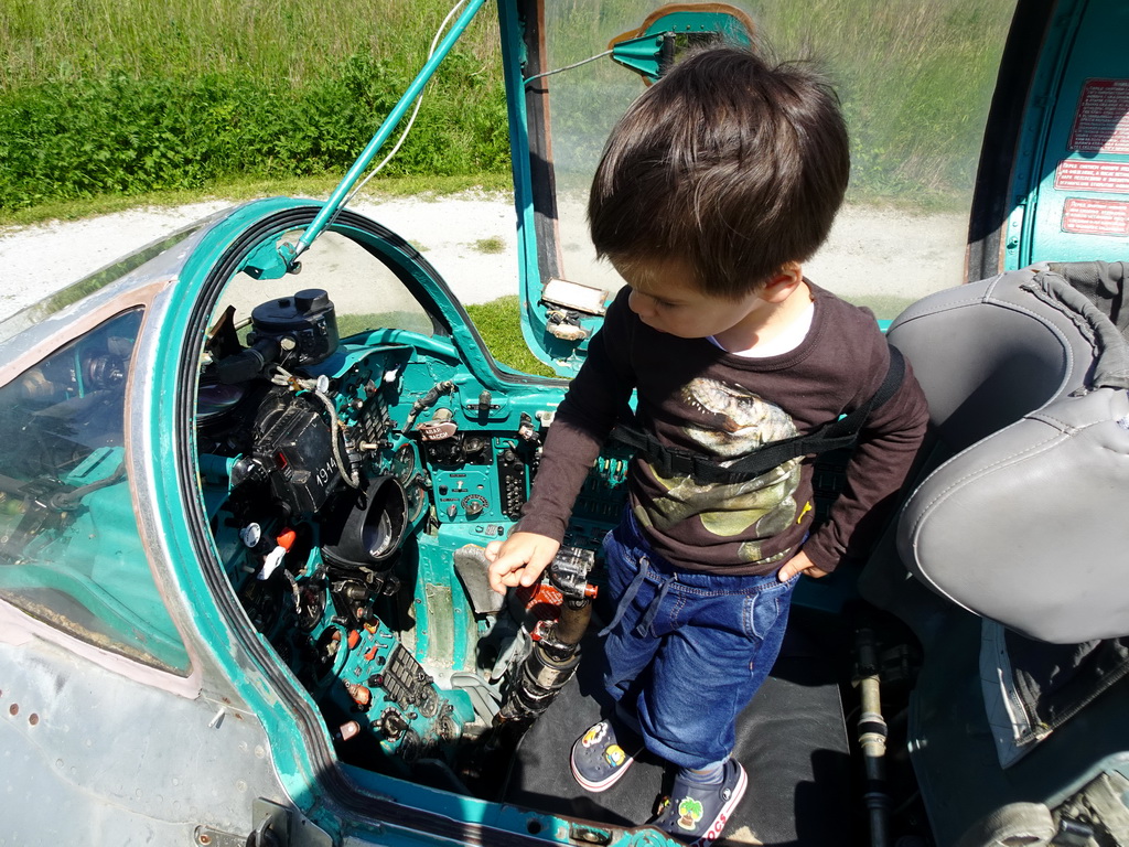 Max in the cockpit of the MIG-21M airplane at the HistoryLand museum