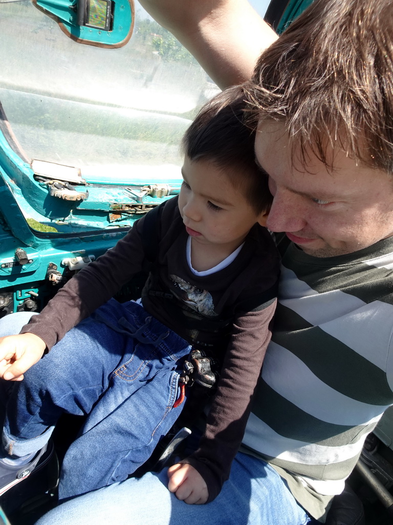 Tim and Max in the cockpit of the MIG-21M airplane at the HistoryLand museum