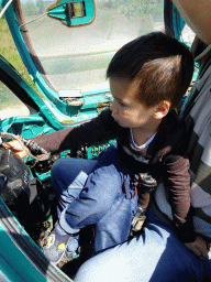 Max in the cockpit of the MIG-21M airplane at the HistoryLand museum