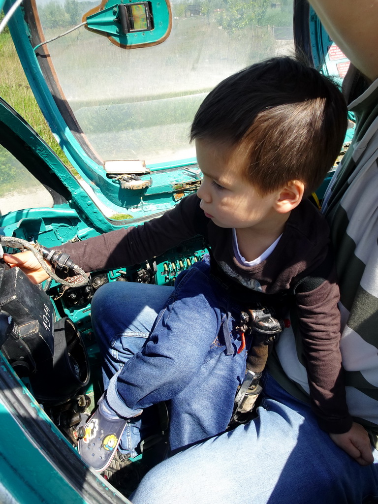 Max in the cockpit of the MIG-21M airplane at the HistoryLand museum