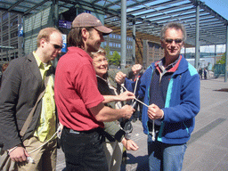 Miaomiao`s colleagues playing games at the Tennispalatsinaukio square