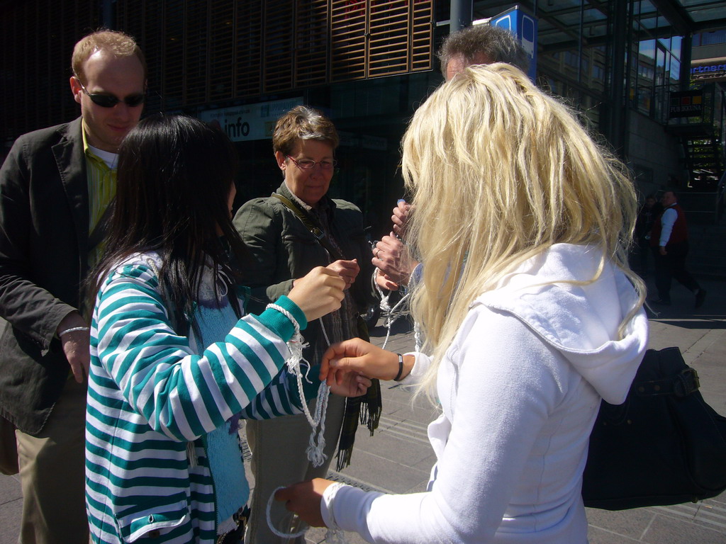 Miaomiao`s colleagues playing games at the Tennispalatsinaukio square