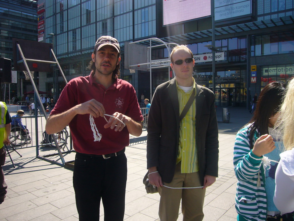 Miaomiao`s colleagues playing games at the Tennispalatsinaukio square