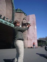 Miaomiao`s colleague in front of the Helsinki Central Railway Station at the Kaivokatu street