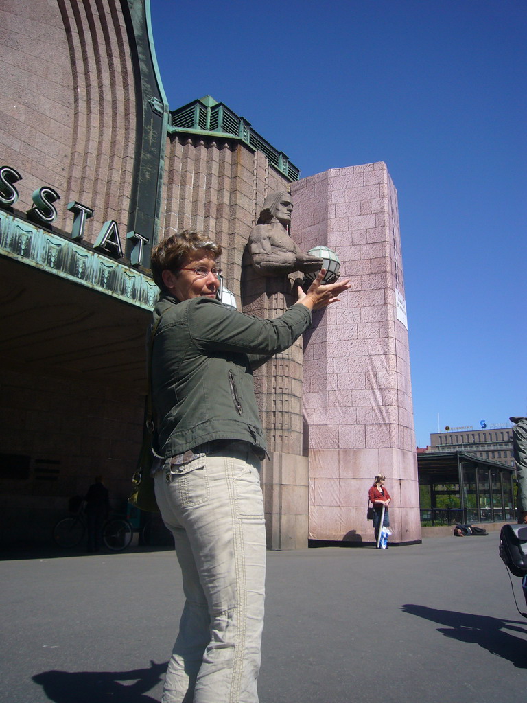 Miaomiao`s colleague in front of the Helsinki Central Railway Station at the Kaivokatu street
