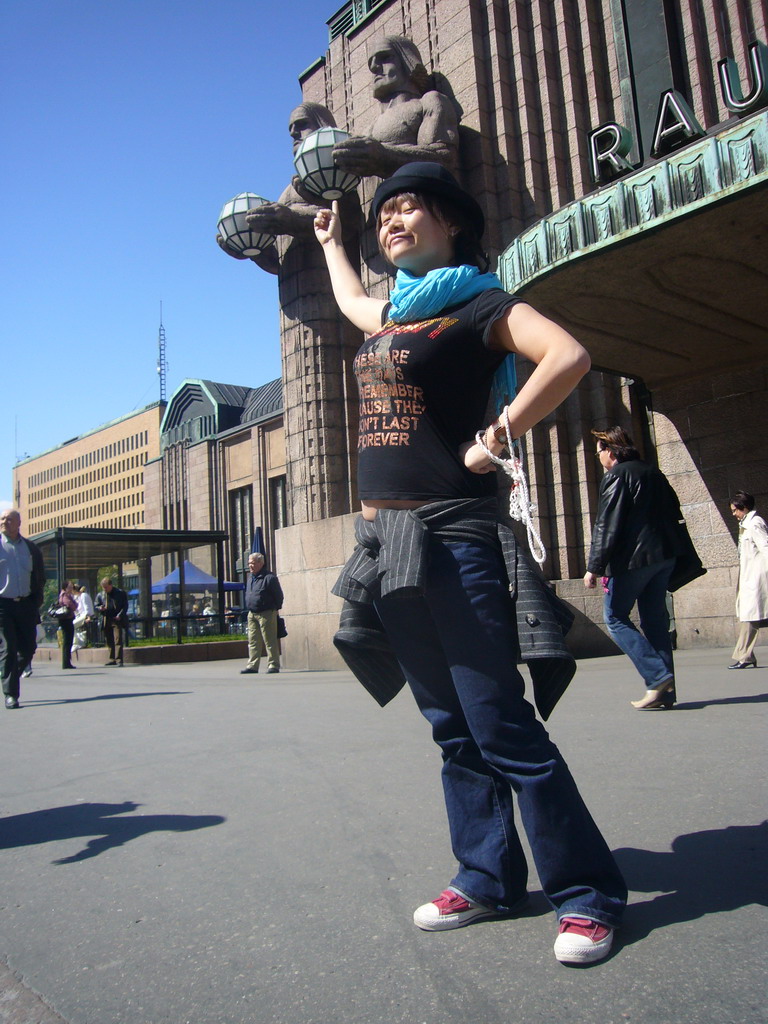 Miaomiao in front of the Helsinki Central Railway Station at the Kaivokatu street