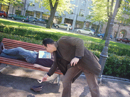 Miaomiao`s colleagues with a bench at the Esplanadi park