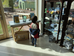 Max at the shop at the entrance building of the GeoFort