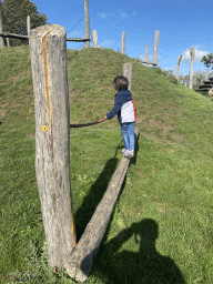 Max on a rope bridge at the Bat Playground at the GeoFort