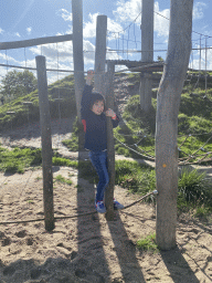 Max on a rope bridge at the Bat Playground at the GeoFort