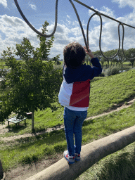 Max on a rope bridge at the Bat Playground at the GeoFort