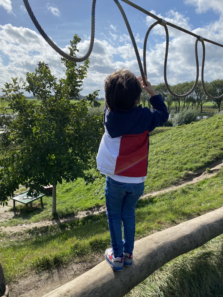 Max on a rope bridge at the Bat Playground at the GeoFort