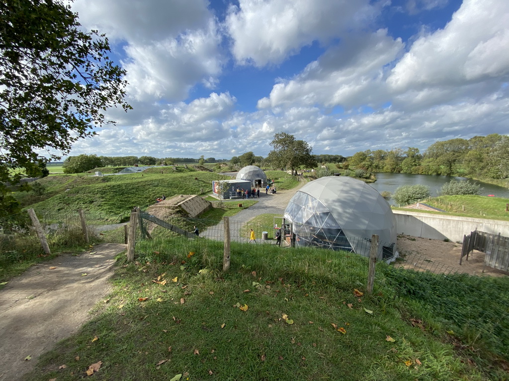 The Straw Bales House, the Expedition Earth attraction and the Climate Quest attraction at the GeoFort, viewed from the hill