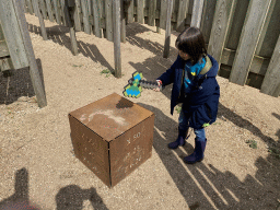 Max with a Minecraft axe and a cube at the Salmon Maze at the GeoFort
