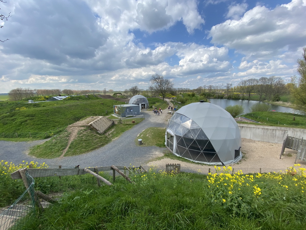 The Straw Bales House, the Expedition Earth attraction and the Climate Quest attraction at the GeoFort, viewed from the hill