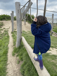 Max on a rope bridge at the Bat Playground at the GeoFort