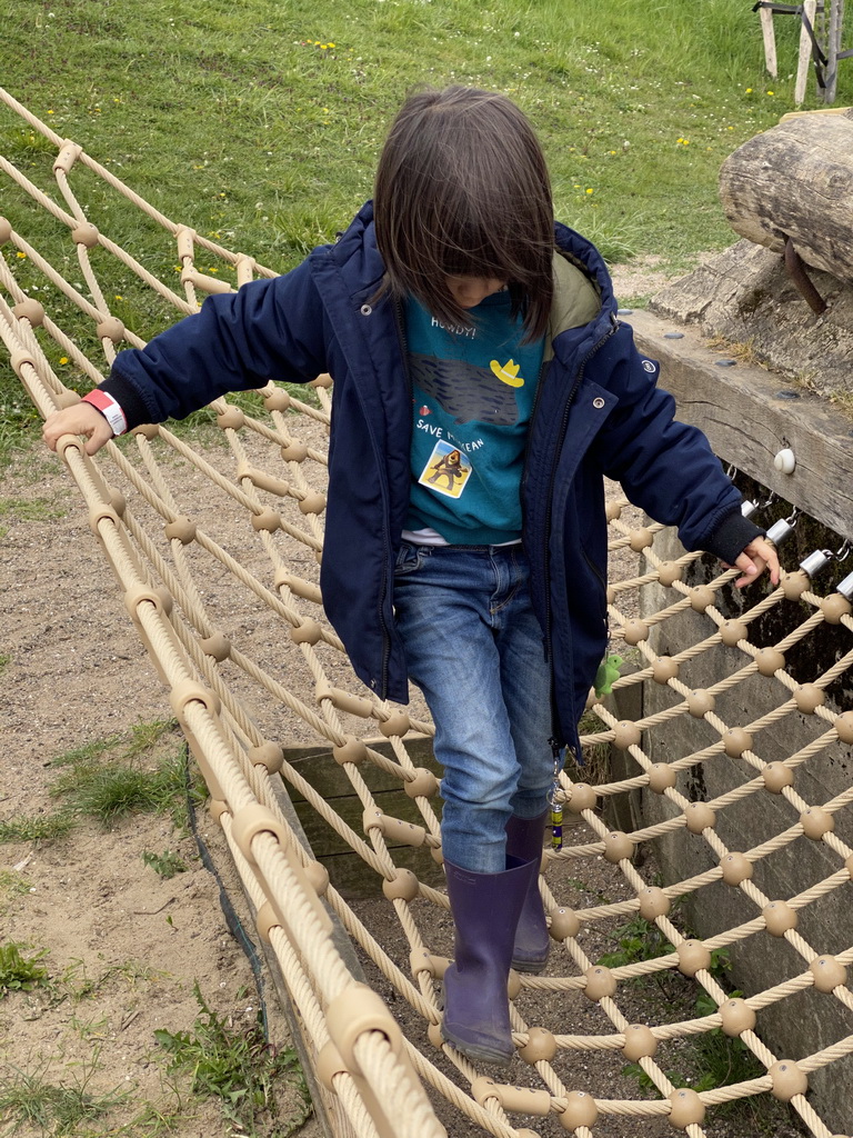 Max on a rope bridge at the Bat Playground at the GeoFort