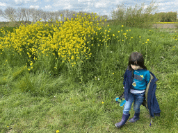 Max with a Minecraft axe and flowers near the Bat Playground at the GeoFort