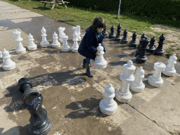Max playing chess at the GeoFort