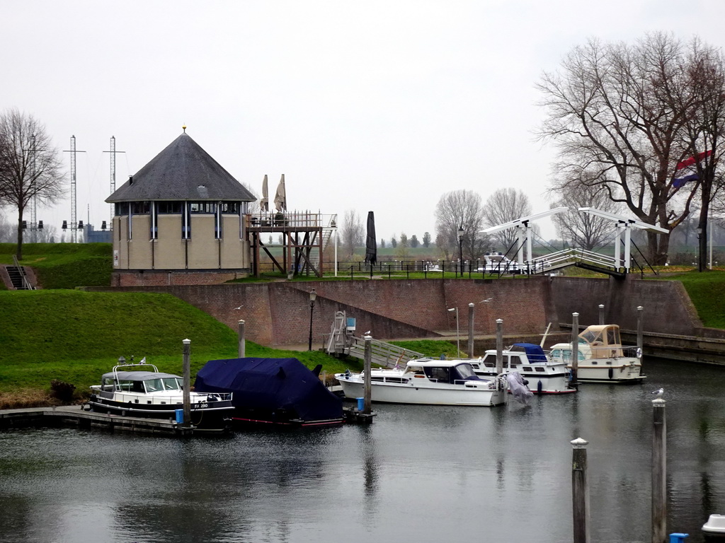 Boats and bridge at the De Wiel lake and the Boei35 restaurant, viewed from the south side