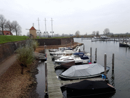 Boats at the east side of the Stadshaven harbour and Windmill nr. II