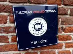 Sign of the European Walled Towns at the front of the Veerpoort gate