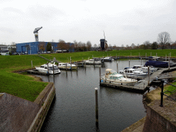 Boats at the De Wiel lake and Windmill nr. III, viewed from near the Boei35 restaurant