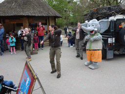 Mascot `Djambo` and people dancing during the Djambo Show near the Kongo restaurant at the Safaripark Beekse Bergen