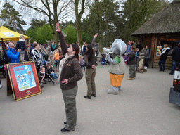 Mascot `Djambo` and people dancing during the Djambo Show near the Kongo restaurant at the Safaripark Beekse Bergen