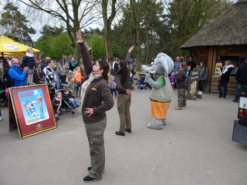 Mascot `Djambo` and people dancing during the Djambo Show near the Kongo restaurant at the Safaripark Beekse Bergen