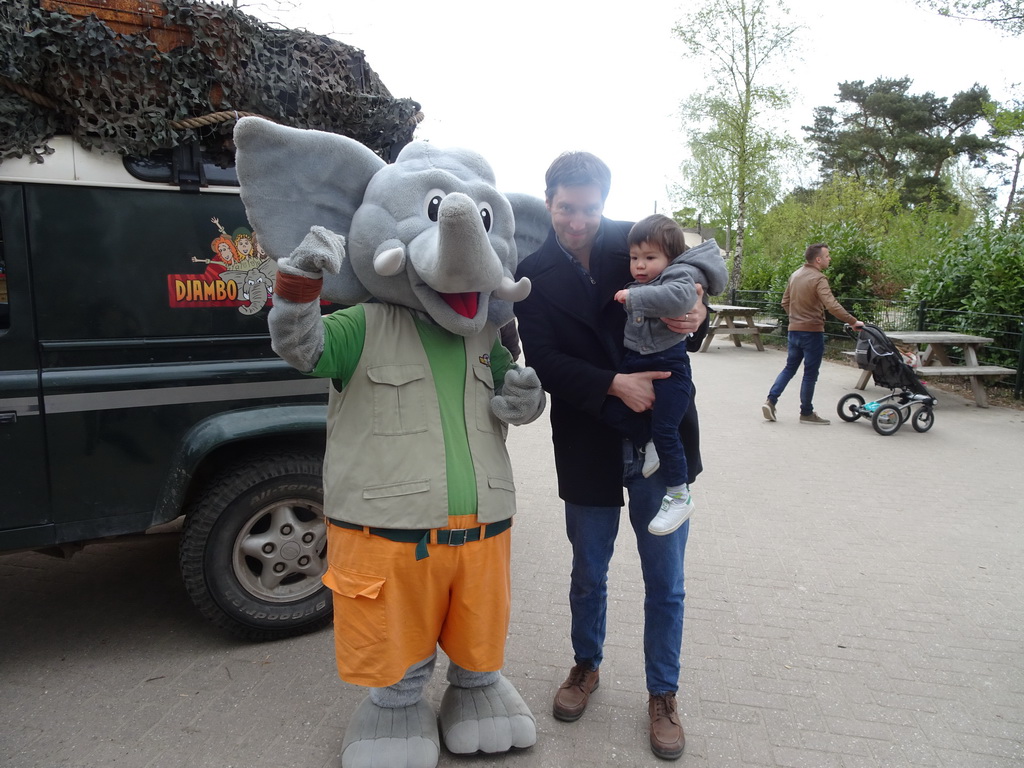 Tim and Max with the mascot `Djambo` after the Djambo Show near the Kongo restaurant at the Safaripark Beekse Bergen