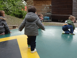 Max and other children on the trampoline near the Kongo restaurant at the Safaripark Beekse Bergen