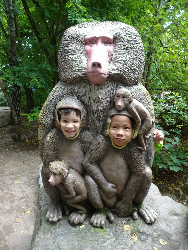 Max and his friend with a Baboon statue at the Safaripark Beekse Bergen